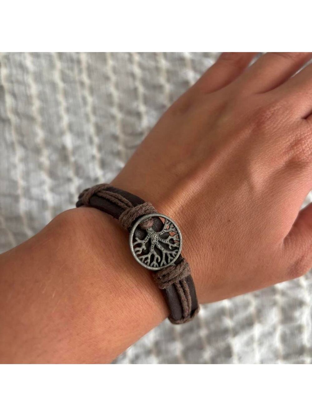 Brown leather bracelet with tree